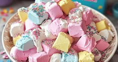 a plate full of marshmallows and sprinkles