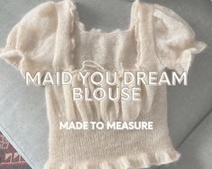 a sweater with the words maid you dream blouse made to measure on it