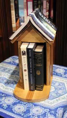 a book stand with books on top of it