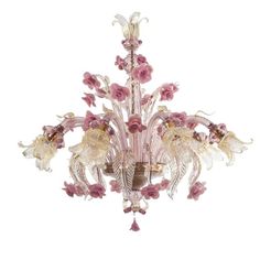 a glass chandelier with pink flowers and leaves