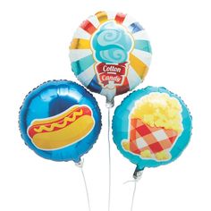 three balloon shaped like hotdogs and balloons