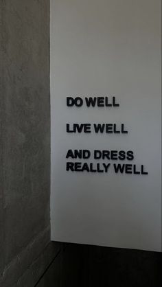 a sign that says do well live well and dress really well