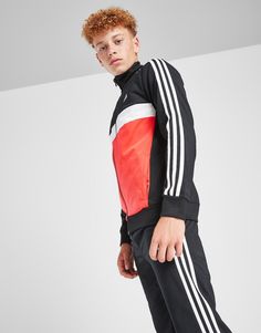 Suit up for sporty days with this juniors' Tiberio Tracksuit from adidas. In a Black and Bright Red colourway, this set is made from recycled polyester fabric, with sweat-wicking AEROREADY tech to keep you cool. The jacket has a stand-up collar and a full zip front, while the pants feature a drawcord tie on the elasticated waistband. Finished off with side pockets, the 3-Stripes and the Sportswear logo. Machine washable. | IY1795 Sportswear Logo, Football Calendar, Football Training, Recycled Polyester Fabric, Suit Up, All Team, Football Kits, Football Boots, Jd Sports