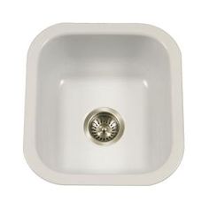 a white sink with a drain in the middle and a strainer at the bottom