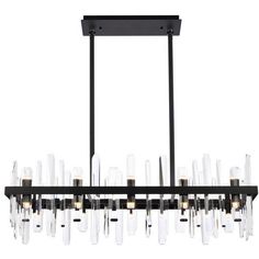 a large chandelier with clear glass tubes hanging from it's black frame