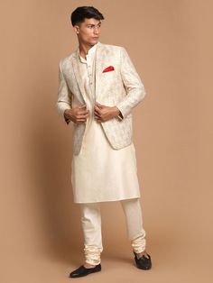 Vastramay Men's Gold Woven Blazer And Cream Solid Kurta With Pajama Set Festive Gold Blazer For Semi-formal Occasions, Festive Semi-formal Gold Blazer, Classic Gold Long Sleeve Sets, Festive Gold Semi-formal Blazer, Designer Gold Suit For Festive Occasions, Designer Gold Long Sleeve Sets, Gold Blazer For Festive Wedding, Festive Gold Blazer For Wedding, Gold Unstitched Suit For Formal Festivals