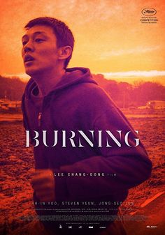 the movie burning features a young man running in front of an orange and pink sky