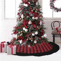 a christmas tree decorated with red and white ornaments