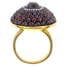 Antique ring: A Yellow Gold Bohemian Garnet And Pearl Ring sold by Doyle & Doyle vintage and antique jewelry boutique. Elegant Faceted Ruby Ring For Formal Occasions, Elegant Formal Faceted Ruby Ring, Elegant Multi-stone Dome Ring Gift, Elegant Multi-stone Dome Ring As Gift, Elegant Multi-stone Garnet Rings, Elegant Oval Multi-stone Dome Ring, Elegant Faceted Ruby Ring, Elegant Faceted Round Ruby Ring, Pearl Ring