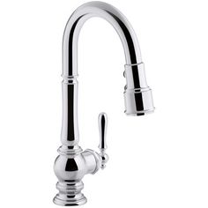 the kitchen faucet is chrome and has an adjustable spout for water to fill up