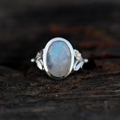 Rainbow Moonstone Ring, Moonstone Silver Ring, 925 Sterling Silver Ring, June Birthstone Ring, Women Ring, Gift For Her, Anniversary Gift Metal: 925 Sterling Silver Gemstone : Natural Moonstone Stone Color : White Stone Shape : Oval Stone Setting: Bezel Benefits of wearing Rainbow Moonstone :- The Blue Turquoise can help you strike the right balance in your emotional state too, by being an efficient healer and ensuring the well-being of your body and mind. Holding or wearing this gemstone can al Mystical Sterling Silver Moonstone Birthstone Ring, Celestial Style Moonstone Promise Ring In Sterling Silver, Celestial Sterling Silver Moonstone Promise Ring, Sterling Silver Celestial Moonstone Promise Ring, Minimalist Sterling Silver Cabochon Moonstone Ring, Sterling Silver Moonstone Ring For Promise, Celestial Style, Celestial Oval Moonstone Ring In Sterling Silver, Sterling Silver Oval Rings With Moon Phase, Sterling Silver Oval Rings With Moon Phase Detail