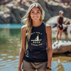 Hit the water in style with our "Out for a Good Paddling" Kayaking Sleeveless Barnard Tank! Featuring a cheerful image of a happy kayaker and the playful text "OUT FOR A GOOD PADDLING," this tank is perfect for kayaking enthusiasts. The unisex design makes it an ideal gift for both him and her, offering comfort and style for any adventure. Whether you're out on the water, enjoying a sunny day, or just showing off your love for kayaking, this tank is a fun and versatile addition to your wardrobe. Moisture-wicking Tops For Water Sports In Summer, Summer Moisture-wicking Tops For Water Sports, Beach-appropriate Sleeveless Moisture-wicking Tops, Sporty Black Tops For Water Sports, Sporty Summer Tops For Outdoor Activities, Beach Sleeveless Moisture-wicking Top, Beach Moisture-wicking Sleeveless Tops, Sporty Tops For Summer Outdoor Activities, Sleeveless Moisture-wicking Tops For The Beach