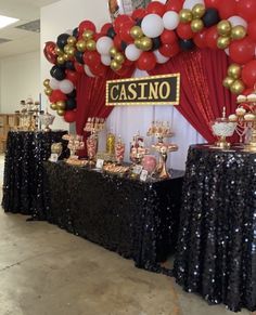 a casino themed birthday party with balloons and candy buffet table set up for an event