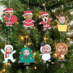 a christmas ornament hanging from a tree with pictures of babies and dogs on it