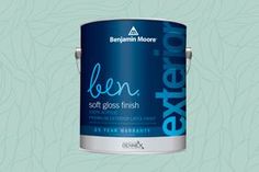 a blue paint can with the words ben soft gloss finish next to it on a white background