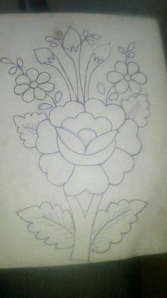 a drawing of flowers on a piece of white paper with black lines in the middle