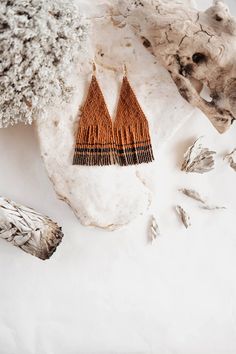 Artisan Handwoven Teardrop Earrings, Artisan Handwoven Orange Earrings, Artisan Orange Handwoven Earrings, Brown Handwoven Drop Earrings, Traditional Woven Dangle Jewelry, Festival Woven Dangle Jewelry, Woven Dangle Earrings For Festival, Woven Beaded Dangle Earrings For Gifts, Orange Woven Jewelry As A Gift