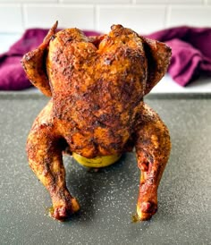 a cooked chicken sitting on top of a counter