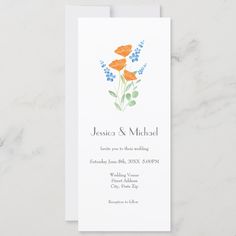 an orange and blue flower is on the front of this wedding program card, which features watercolor flowers