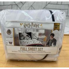 the harry potter bed set is packaged in plastic and ready to be shipped into the store