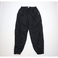 Vintage 90s Reebok Mens XL Faded Spell Out Cuffed Nylon Joggers Pants Black Mens Pants Has color fade Mens size XLarge Measurements are: 15 inches across the waist laid flat 32 inch inseam 44.5 inches from top to bottom Black Nylon US Shipping is FREE, Canada is $15 and International is $24 Check out my other items in my store! PR1940 Nylon Joggers For Streetwear Style, 90s Style Black Sports Pants, Moisture-wicking Cargo Pants For Streetwear, Sportswear Parachute Pants For Streetwear, 90s Style Sports Pants With Pockets, 90s Style Nylon Sports Pants, 90s Sporty Pants With Pockets, Black Pants Men, Black Slides