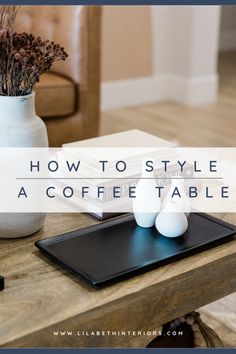 a coffee table with three eggs on it and the words how to style a coffee table