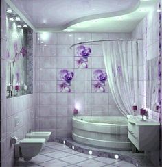 a white bathroom with purple flowers on the walls