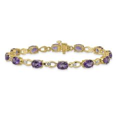 14K Two-tone Gold with rhodium over 14k yellow gold 9 cttw amethyst and diamond bracelet. Measures approximately 3/16 of an inch in width and has a box catch closure. Amethyst Gemstone, Diamond Gemstone, Purple Amethyst, Gold Material, Gemstone Colors, A Box, The Collection, Diamond Bracelet, Two Tone