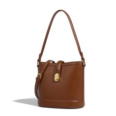 This bucket bag is crafted from soft PU leather in a timeless silhouette that'll work for every day. With double straps, you can wear it in different ways and it's spacious enough for all your essentials. This tan brown shade is perfect for styling with knitwear and printed dresses this year.Weight: 720 gWidth (cm): 15 cmHeight (cm): 22.5 Color: CoffeeStrap Length: 53 cmInterior Material: PolyesterMaterial_bag: PU LeatherBagType: Handbag & Crossbody bagBag Length: 24 cm Luxury Timeless Leather Bucket Bag, Modern Bucket Shoulder Bag With Removable Pouch, Versatile Bucket Hobo Bag, Modern Bucket-shape Shoulder Bag With Removable Pouch, Modern Bucket Shape Shoulder Bag With Removable Pouch, Modern Hobo Bag With Bucket Shape, Timeless Formal Crossbody Bucket Bag, Versatile Bucket Shoulder Bag, Everyday Hobo Bag With Bucket Shape