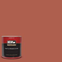 a can of behr paint on a white background