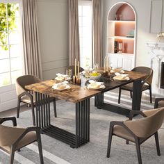 a dining room table with chairs and plates on top of it in front of a fireplace