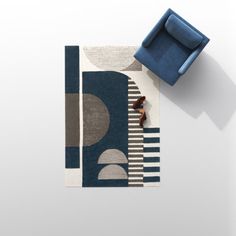 an overhead view of a blue chair and rug