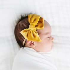 Dress it up! Handmade by local moms from soft, high-quality velvet. Sizes Available: Small (2.75" x 3"), Large (2.75" x 4.5") Adjustable Bow Headband, Yellow Adjustable Headband, Adjustable Yellow Headband, Soft Baby Clothes, Newborn Needs, Newborn Bows, Sweet Accessories, Happy Mom, Small Bows