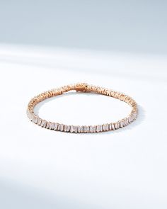 This Classic Diamond Mini Baguette Tennis Bracelet is one of our bestselling styles. We love this piece for its elegance and wear-ability. Beautiful mini baguette diamonds are meticulously set in a vertically staggered setting for a modern feel. Stack it next to one of our bangles for an elevated look. Details 18k rose gold, yellow gold or white gold 2.90 carats of baguette white diamonds Bracelet measures 7" inches in length Box clasp with safety lock fastening Please note, the model is using h Mini Baguette, Diamonds Bracelet, Baguette Diamonds, Box Clasp, Tennis Necklace, Tennis Bracelet Diamond, Classic Mini, Baguette Diamond, Diamond Bracelets