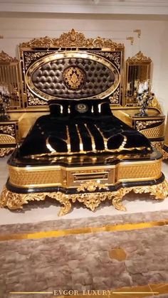 a gold and black bed in a room