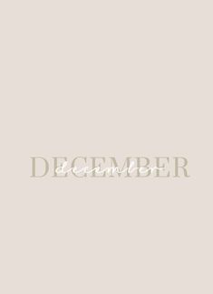 the word december written in white on a beige background