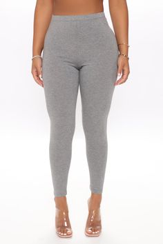 Available In Black, Charcoal, Heather Grey, Navy, And White. Leggings Mid Rise Stretch 95% Cotton 5% Spandex Imported | Lean On Me Leggings in Heather Grey size Small by Fashion Nova Gray Elastane Bottoms, Solid Color Elastane Leggings For Loungewear, High Waist Gray Elastane Bottoms, Gray Elastane Leggings For Loungewear, Gray Leggings With Elastic Waistband, Gray Stretch Elastane Bottoms, Gray High-stretch Elastane Bottoms, Elastic Elastane Leggings, Gray Elastane Yoga Bottoms