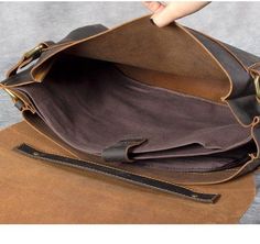 This vintage leather briefcase laptop bag is made of full grain leather and has strong and adjustable shoulder strap.Detachable shoulder strap are convenient and useful to provide maximum support for your shoulders, offering extra comfort when carrying heavy items to tack the stress off.  ITEM FEATURES - 2 x Main Compartments 
- 1 x Front Compartment (9.7" iPad) 
- 1 x Laptop Compartment 
- 1 x Interior Zipper Pocket 
- 2 x Side Pockets 
- Genuine Leather & Durable 
- Removable Shoulder Strap 
- Fit 14" Laptop 
 
 
 ITEM DETAILS *Item Type: Leather Briefcase 
*Material: Crazy Horse Leather 
*Size: L38 *W10 *H28(CM) 
*Color: Dark Brown 
*Closure Type: Flapper 
*Style: Vintage 
 
 CARE INSTRUCTIONS * Our products are designed to last a lifetime 
 
Natural Leather creams and waxes are the Business Briefcase With Adjustable Strap And Flap, Leather Briefcase With Adjustable Strap And Flap, Leather Laptop Bag With Flap, Vintage Shoulder Laptop Bag With Adjustable Strap, Vintage Laptop Shoulder Bag With Adjustable Strap, Vintage Business Laptop Bag With Adjustable Strap, Vintage Laptop Bag With Adjustable Strap For Business, Vintage Business Briefcase With Adjustable Strap, Vintage Briefcase With Adjustable Strap For Business