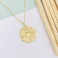 14K Solid Gold Compass Necklace, Personalized Compass Pendant, Compass Jewelry, Compass Traveler Gift  🟠We produce this product in 2 different materials, 14 carat solid gold and 925 sterling silver. and we also complete it in 3 different colors as rose, silver and gold 🟠The material you choose will be sent in the color you choose. 🟠It is free to type on the back 📏Pendant Diameters: 0,53 inches / 13,50mm 0,60 inches / 15,30mm 0,65 inches / 16,51mm (Size used in the ad) 0,70 inches / 17,78mm 0 Gold Anniversary Necklace With Compass Design, Gold Necklace With Compass Design For Anniversary, Anniversary Gold Necklace With Compass Design, Travel Engraved Gold Jewelry, Gold Engraved Jewelry For Travel, Gold Medallion Jewelry For Travel, Gold Round Pendant Necklace For Travel, Gold Necklace With Round Pendant For Travel, Personalized Gold Jewelry For Travel