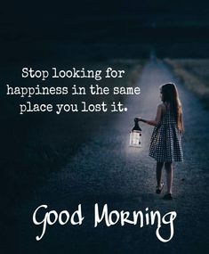 a girl holding a lantern walking down a road with the words good morning on it