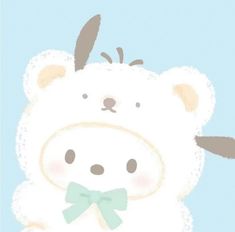 a white bear with a green bow on it's neck and ears is standing in front of a blue background