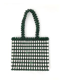 Adisa Bag - Cuckoo B A luxurious handbag, hand beaded by women of the Maasai community in Kenya. It is made beading a mesh with white and silver oval, and emerald green faceted beads.Women from the Maasai tribes had worn and handcrafted beaded accessories for centuries in traditional techniques.Wear it for a special occasion, or for the coolest daytime look. Green Beaded Bag For Party, Green Beaded Bags For Daily Use, Green Beaded Bag, Summer Green Beaded Bag, Green Square Beaded Bag, Maasai, Beaded Accessories, Beaded Bags, Green Bag