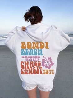 Bondi Beach Hoodie, Summer Hoodie, Streetwear Hoodie, Y2K Hoodie, Women Streetwear, Trendy Hoodie, Aesthetic Shirt Gildan 18500 A unisex heavy blend hooded sweatshirt is relaxation itself. The material is a thick blend of cotton and polyester. This makes for a plush, soft feel alongside warmth. It's also a great surface for printing. There are no side seams. A spacious kangaroo pocket hangs in front. The hood's drawstring is the same color as the base sweater.  * Available hoodie sizes: S -5XL * Women Positivity, Sweatshirts Aesthetic, Honolulu Beach, Vsco Hoodie, Positive Hoodie, Beach Hoodie, Hoodie Aesthetic, Womens Hoodie, Streetwear Hoodie