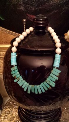 "One strand beaded necklace made with faceted natural jade, turquoise flat beads and turquoise teardrops. The center drop measures about 1\" long and the beige jade is 12mm. This beautiful necklace measures 18\" long. Looks great with lots of outfits. If you like it \" pin it \" or share on Facebook." White Jade Beaded Necklace With Gemstone Beads, Adjustable Turquoise Jade Beaded Necklace, Turquoise Beaded Jade Necklace, Turquoise Gemstone Beads Necklace In Jade, Turquoise Jade Necklace With Gemstone Beads, Hand-strung Turquoise Jade Beaded Necklace, Hand-strung Turquoise Jade Beaded Necklaces, Turquoise Jade Hand-strung Beaded Necklace, Turquoise Jade Hand-strung Necklaces