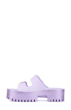 With a cushy insole, this casual slide sandal offers lasting comfort to be a weekend wardrobe favorite. 4 1/2" heel Synthetic upper and lining/rubber sole Imported Casual Jelly Slide Sandals With Removable Insole, Slip-resistant Slide Sandals For Spring, Purple Synthetic Slides With Round Toe, Purple Synthetic Sandals With Removable Insole, Purple Slip-on Beach Slides, Purple Slip-on Slides For Beach, Purple Slip-on Slides For The Beach, Purple Synthetic Slides For Summer, Comfortable Purple Sandals With Cushioned Footbed