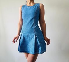 vintage blue denim mini dress,MOD style denim skater dress *size: xxs-xs *measurements (centimeters) bust 76 waist 62 hips 82, length 80 *condition: great vintage condition *fabric: cotton *washing instructions: gently hand wash in cool water or dry clean it Please make sure you check all the measurements of the item before purchasing. Vintage garment sizes are not the same as those of today. To ensure your best fit it's best you measure yourself or a similar item. The size listed it's an approx Fitted Cotton Denim Mini Dress, Fitted Mini Cotton Denim Dress, Medium Wash Denim Mini Dress, Light Wash Denim Mini Dress, Fitted Mini Length Denim Dress, Blue A-line Denim Dress, Fitted Denim Blue Cotton Mini Dress, Vintage Summer Denim Mini Dress, Summer Vintage Denim Mini Dress