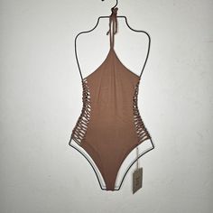 Stone Fox Swim Fella One Piece Swimsuit Rawhide/Brown Size Xs - Nwt Stretch Brown One-piece Swimwear, Stretch Brown Bodysuit For The Beach, Brown Backless Swimwear For The Beach, Brown Backless Beachwear Swimwear, Brown Lined Swimwear For Poolside, Brown Beachwear Bodysuit For Vacation, Chic Brown Lined Swimwear, Brown Stretch Bodysuit, Sleeveless Brown Bodysuit For Summer