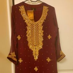 It's A 3 Piece Formal Wear Suit, Fabricpure Chiffon, Hand Work With Swarovski Stone And Dubka, Straight Trouser, Slip Attached To Shirt And Dupatta, It's Medium Size, Designer Name Sophia Traditional Gold Palazzo Set For Party, Festive Gold Palazzo Set For Party Wear, Gold Festive Party Wear Palazzo Set, Unstitched Gold Palazzo Set For Party, Gold Unstitched Palazzo Set For Party, Elegant Semi-stitched Palazzo Set For Party, Gold Palazzo Set For Party Festivals, Elegant Gold Palazzo Set For Party, Embroidered Semi-stitched Palazzo Set For Party