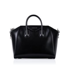 The Givenchy Antigona is one of the most popular and in-demand luxury bags, and has been for quite some time. With its structured silhouette, spacious interior, shiny leather, and classic appearance, this bag is the perfect option for any woman with a love for luxury in search of a glamorous every day bag. Fit all your necessities inside the large interior, with additional zip pocket and two mobile pone compartments. The Antigona is the perfect mix of luxury and practicality, as it offers function as well as timeless sleekness and sophistication. SPL Exterior  Black, shiny calfskin Silver tone hardware Givenchy embossed logo Detachable shoulder strap Two top handles Zip close Very good condition  Interior  Black lining Spacious compartment Zip pocket Two mobile phone pockets Givenchy embos Givenchy Antigona, Goal Digger, Timeless Handbag, Day Bag, Bags Designer Fashion, Exclusive Bag, Embossed Logo, Leather Mini, Handbag Backpack