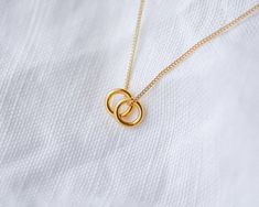 This beautiful necklace features a 24k gold plated circle necklace in a beautiful gift box. P E R S O N A L I S A T I O N∙ ADD ON ∙ Jewellery card ∙  www.etsy.com/uk/listing/789605561 (Birthday, Soul Sister, Friendship cards available)D E T A I L S ∙ made from 925 sterling silver, 24k gold plated∙ eco-friendly jewelry box with foiled pressed NJ Studio logo∙ no receipt included - gift-giving ready!∙ nickel freeAvailable in silver: www.etsy.com/uk/listing/788792801S I Z E∙ 16 in (40 cm)∙ 18 in (45 Gold Circle Necklace For Mother's Day, Birthday Soul Sister, Sister Birthday Gifts, Jewellery Card, Soul Sisters Gifts, Mother Daughter Bracelets, Little Sister Gifts, Mother Necklace, Gold Circle Necklace